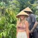 Tourists enjoying a traditional coffee farm tour in Bintan, easily accessible with our reliable taxi services.